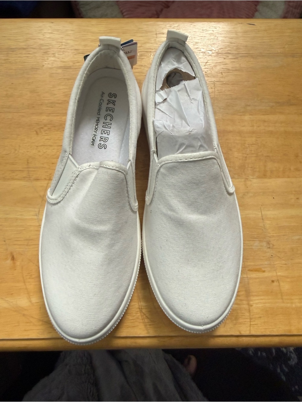 Skechers women’s Street Slip-On Canvas Shoe in White